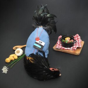 Chapon effilé et plumage à sec dans sa parure de Noël